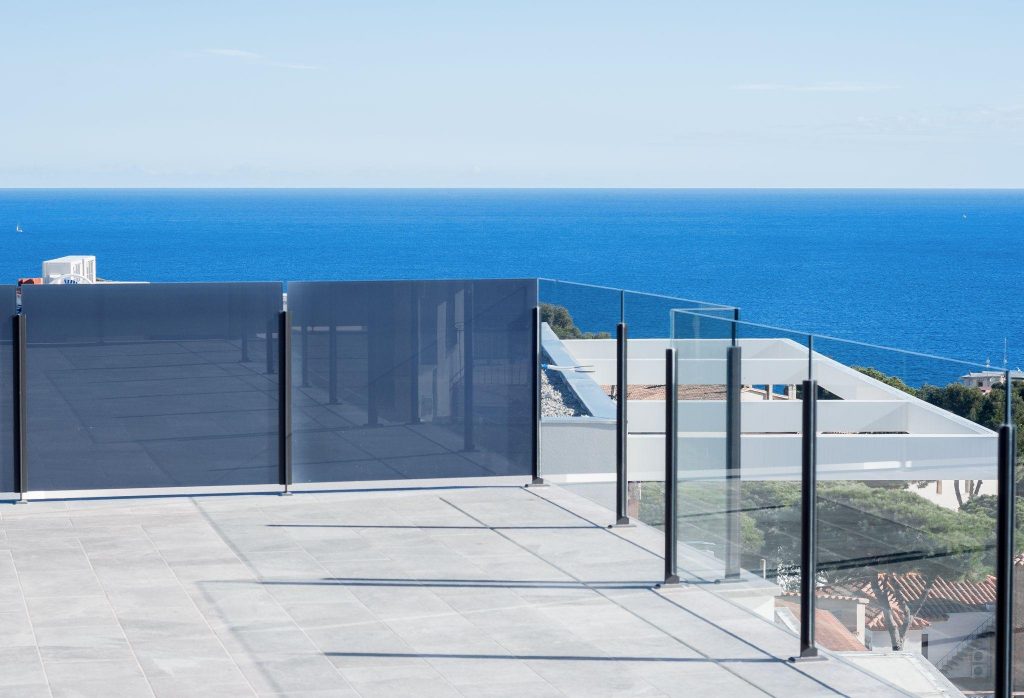 Glass balcony with sea views.
